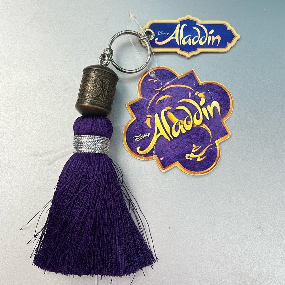 Authentic DISNEY Broadway Aladdin Tassel Keychain- NWT